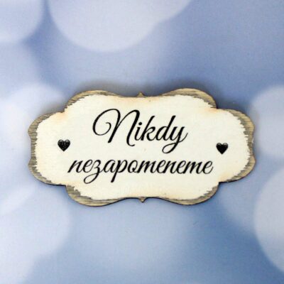 "Nikdy nezapomeneme" sign - color white with patina